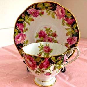 Queen Anne Bone China Teacup and Saucer in the Pattern “Black Magic”